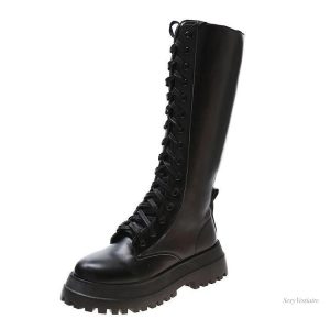 Bottes plates sexy en cuir noir pour un look élégant